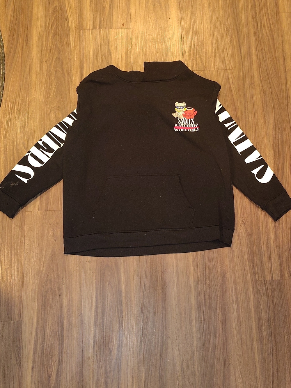 Black Pullover Hoodie with Sleeve Lettering and Chest Graphic
